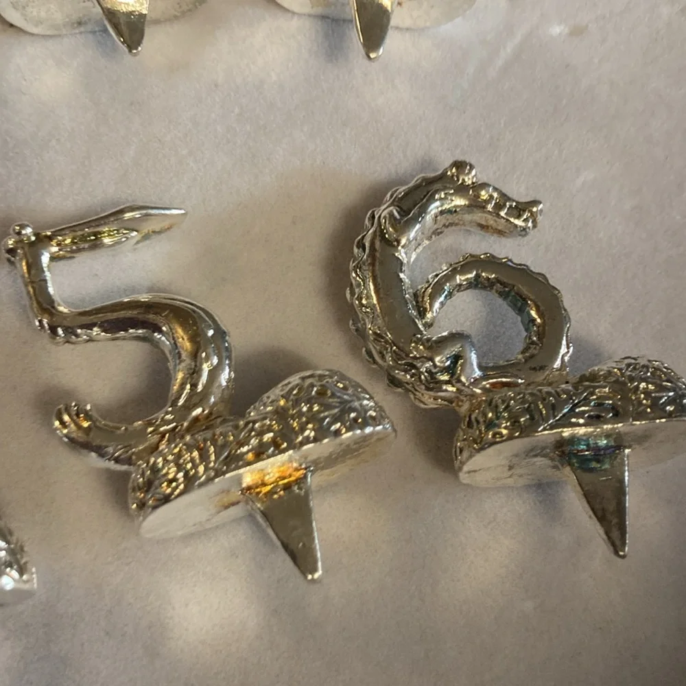 Silver tone animal birthday markers holds candle in each one . 1-6 . Pre owned
